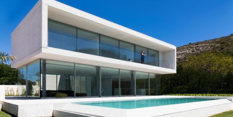 New build design villa with sea views in Moraira El Portet - Pool terrace, villa and garden - ID: 5500692 - Architect Dalia Alba - Photographer Javier Briones