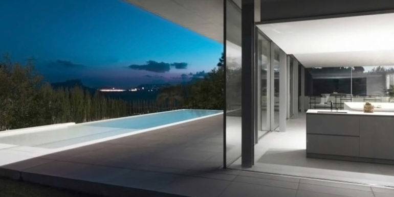 New build design villa with sea views in Moraira El Portet - Sea views by night, pool and villa illuminated - ID: 5500692 - Architect Dalia Alba - Photographer Javier Briones