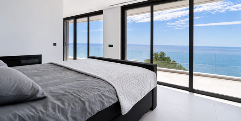 Luksusowa rezydencja w pierwszej linii brzegowej w Jávea Ambolo - Sypialnia z widokiem na morze - ID: 5500672 - Architekt POM Architectos
